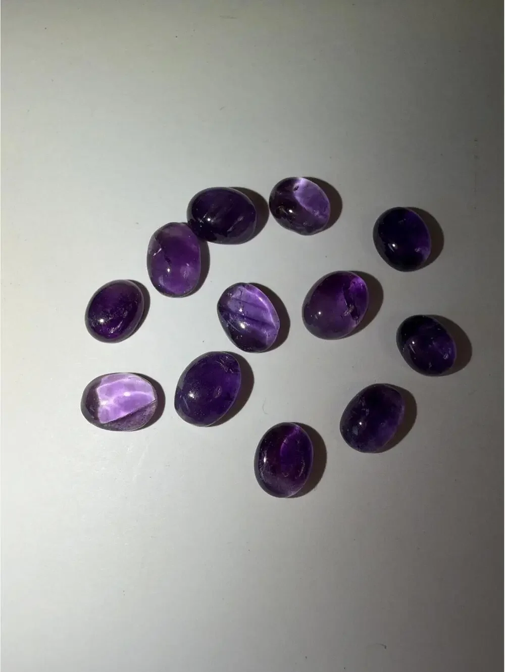GEMS Set of 12 Polished Natural Amethyst Cabochon Shape Gemstones